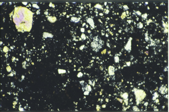 Color 1.4 MM Thin Section photograph of Apollo 12 Sample(s) 12034,35 using cross nichols light.