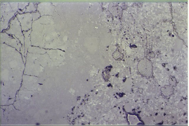 Color photograph of Apollo 17 Sample(s) 76315,93; 1.4 MM Thin Section photograph using reflected light.