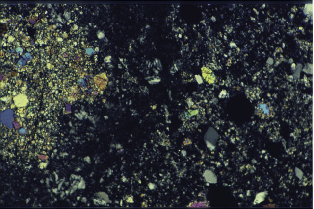 Color photograph of Apollo 17 Sample(s) 76315,93; 1.4 MM Thin Section photograph using cross nichols light.