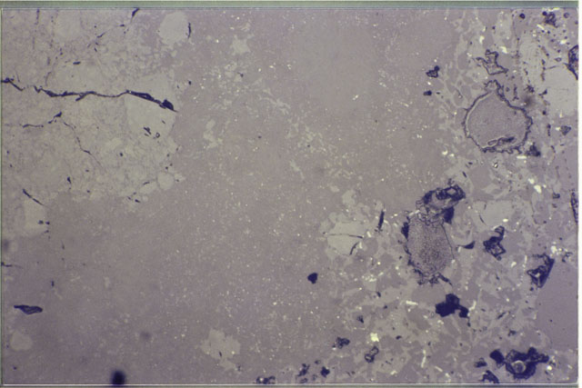 Color photograph of Apollo 17 Sample(s) 76315,93; .69 MM Thin Section photograph using reflected light.