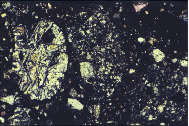 Color 1.4 MM Thin Section photograph of Apollo 14 Sample(s) 14301,81 using cross nichols light.