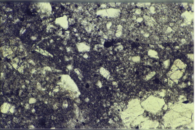 Color 1.4 MM Thin Section photograph of Apollo 14 Sample(s) 14304,13 using transmitted light.