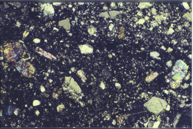 Color 1.4 MM Thin Section photograph of Apollo 14 Sample(s) 14304,13 using cross nichols light.