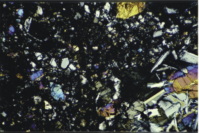 Color 1.4 MM Thin Section photograph of Apollo 17 Sample(s) 72275,148 using cross nichols light.