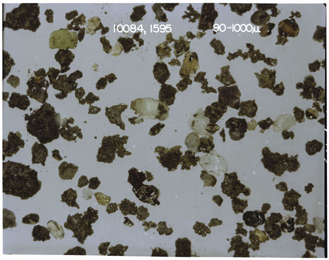 Color photograph of Apollo 11 Sample(s) 10084,1595; Processing photograph displaying a soil at 90-1000 micron.