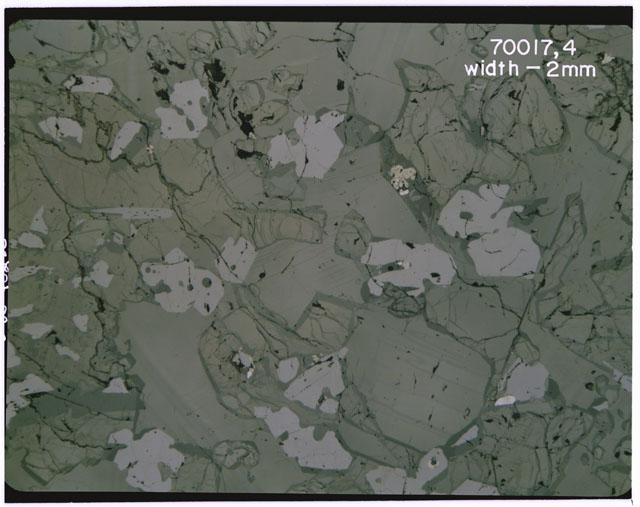 Color 2 MM Thin Section photograph of Apollo 17 Sample(s) 70017,4 using transmitted light.