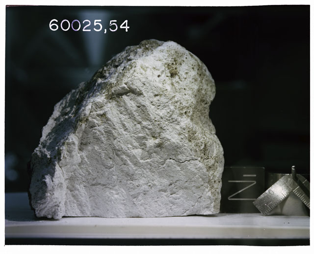 Color photograph of Apollo 16 Sample(s) 60025, 54; Ortho photo with orientation N.