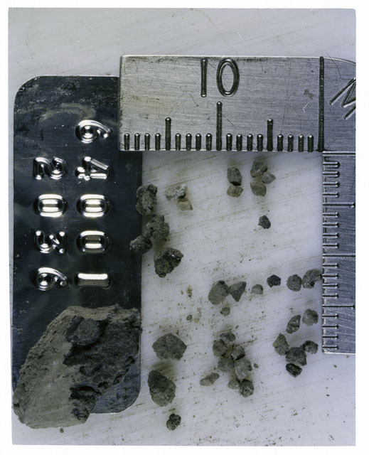 Color photograph of Apollo 16 Core Sample 64001,2036; Processing photograph displaying Core Fines .