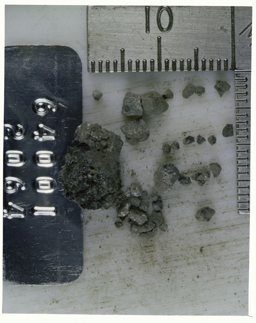 Color photograph of Apollo 16 Core Sample 64001,2064; Processing photograph displaying Core Fines .