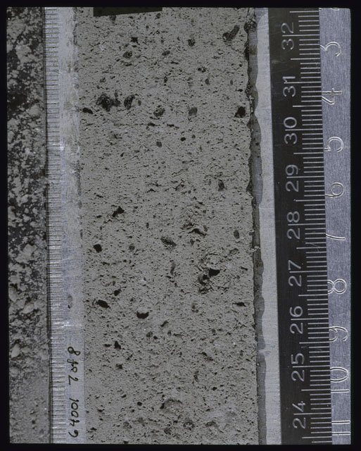 Color photograph of Apollo 16 Sample(s) 64001; 7 of 8 Processing photograph displaying post peel Core at 24-32.5 cm depth.