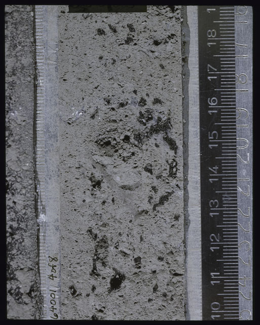 Color photograph of Apollo 16 Sample(s) 64001; 4 of 8 Processing photograph displaying post peel Core at 10-19 cm depth.