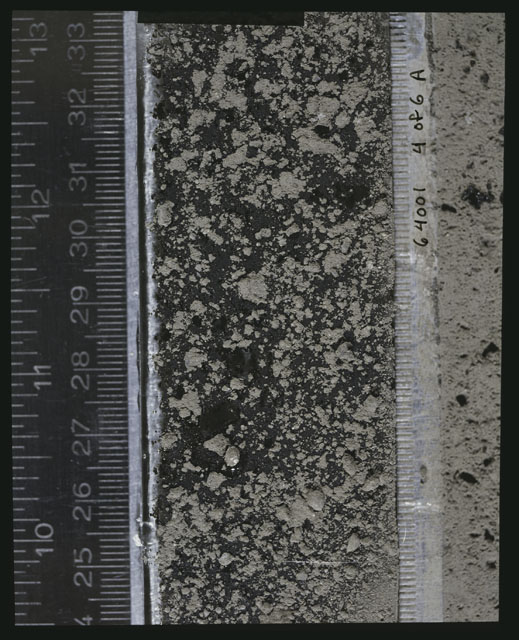 Color photograph of Apollo 16 Sample(s) 64001; 4 of 6 A Processing photograph displaying peel Core at 24.5-33.5 cm depth.