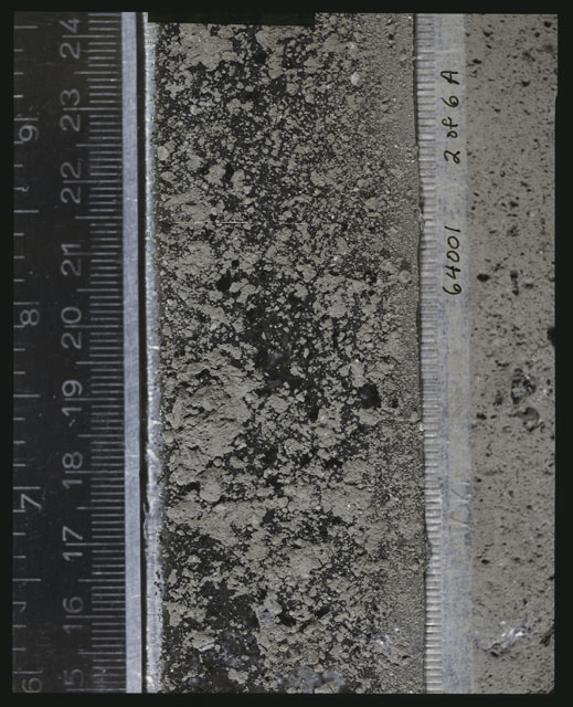 Color photograph of Apollo 16 Sample(s) 64001; 2 of 6 A Processing photograph displaying peel Core at 15-24.5 cm depth.