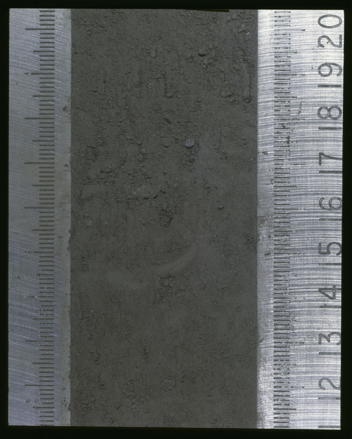 Color photograph of Apollo 16 Sample(s) 64001,1; Processing photograph displaying Core at 11.5-20.5 cm depth.