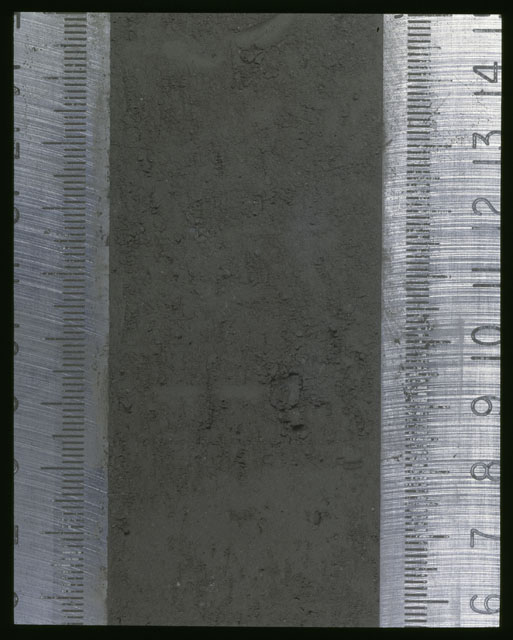 Color photograph of Apollo 16 Sample(s) 64001,1; Processing photograph displaying Core at 6-14.5 cm depth.