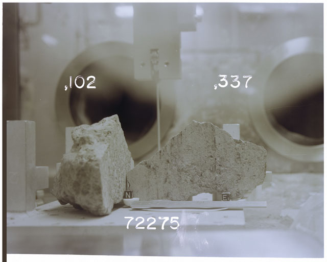Color photograph of Apollo 17 Sample(s) 72275,102,337; Processing photograph of the orientation of a sawed pie cutting.