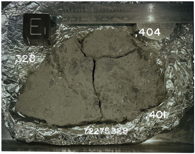 Color photograph of Apollo 17 Sample(s)72275,328,404,401; Processing photograph displaying slab reconstruction with an orientation of E.