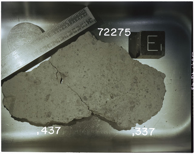 Color photograph of Apollo 17 Sample(s)72275,437; Processing photograph displaying slab reconstruction with an orientation of E.