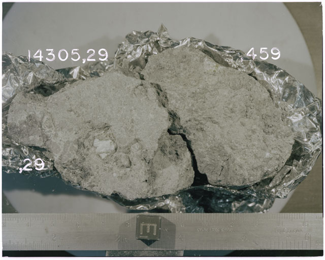 Color photograph of Apollo 14 Sample(s) 14305,29,459; Processing photograph displaying reconstruction.