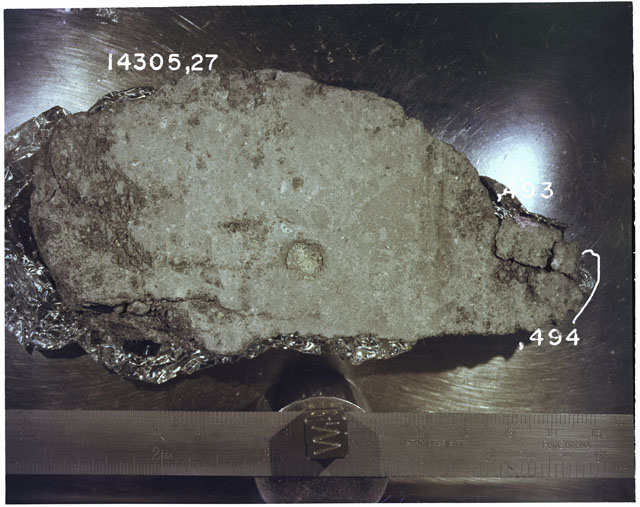 Color photograph of Apollo 14 Sample(s) 14305,27,49,493; Processing photograph displaying the orientation of a slab.