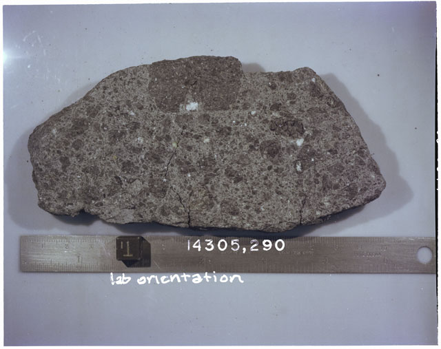 Color photograph of Apollo 14 Sample(s) 14305,290; Processing photograph displaying a slab with an orientation of T.