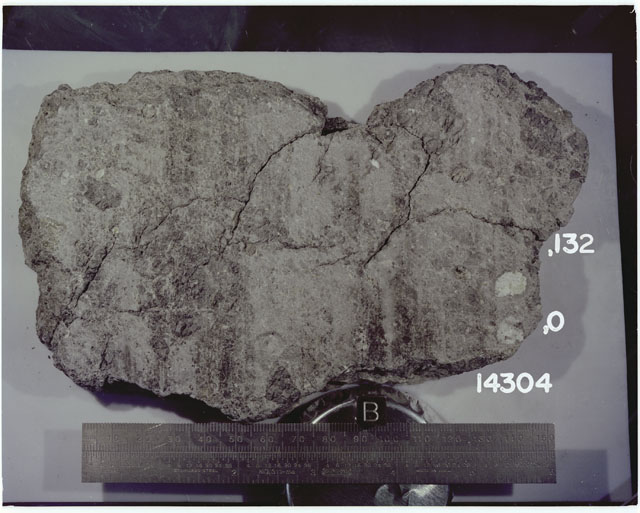 Color photograph of Apollo 14 Sample(s) 14304,0,132; Processing photograph displaying a slab reconstruction with an orientation of B.