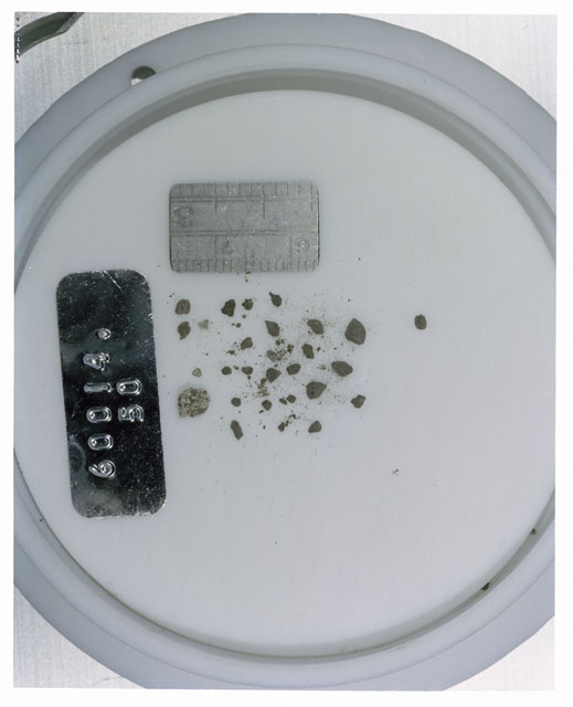 Color photograph of Apollo 16 Core Sample 60014,50; Processing photograph displaying >1 MM Core Fines .