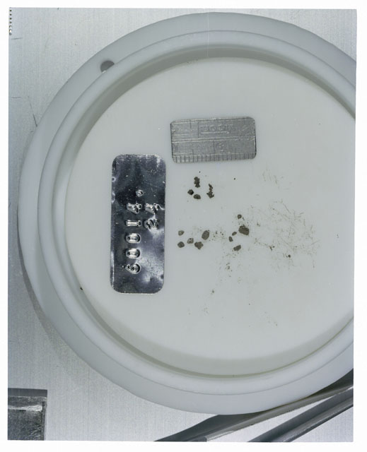 Color photograph of Apollo 16 Core Sample 60014,24; Processing photograph displaying >1 MM Core Fines .
