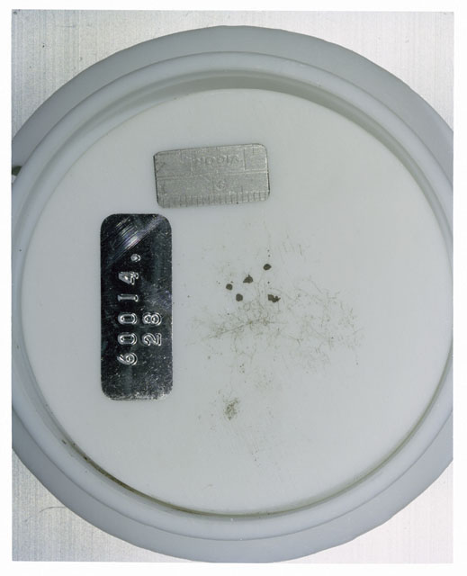 Color photograph of Apollo 16 Core Sample 60014,28; Processing photograph displaying >1 MM Core Fines .
