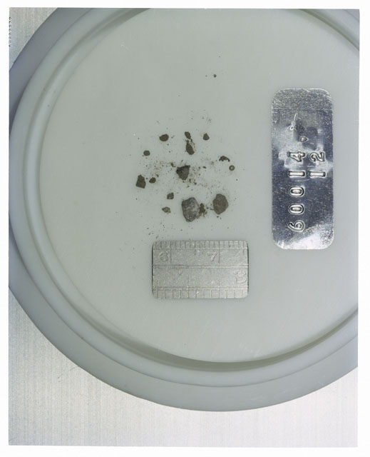 Color photograph of Apollo 16 Core Sample 60014,12; Processing photograph displaying >1 MM Core Fines .