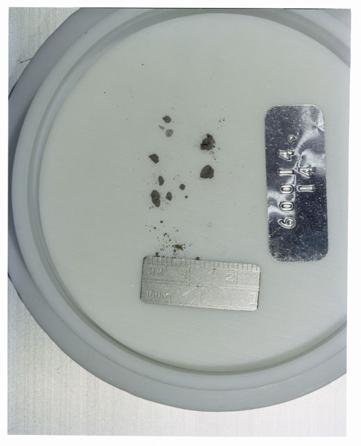 Color photograph of Apollo 16 Core Sample 60014,14; Processing photograph displaying >1 MM Core Fines .