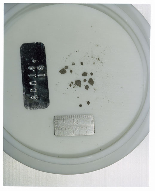 Color photograph of Apollo 16 Core Sample 60014,18; Processing photograph displaying >1 MM Core Fines .