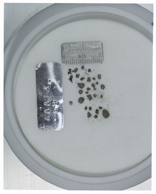 Color photograph of Apollo 16 Core Sample 60014,83; Processing photograph displaying >1 MM Core Fines .