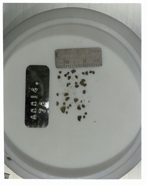 Color photograph of Apollo 16 Core Sample 60014,74; Processing photograph displaying >1 MM Core Fines .