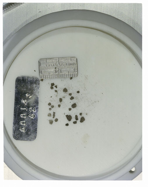 Color photograph of Apollo 16 Core Sample 60014,62; Processing photograph displaying >1 MM Core Fines .