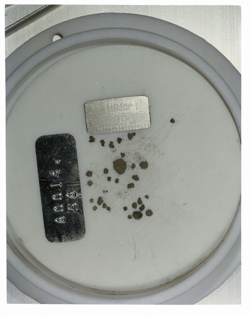 Color photograph of Apollo 16 Core Sample 60014,56; Processing photograph displaying >1 MM Core Fines .