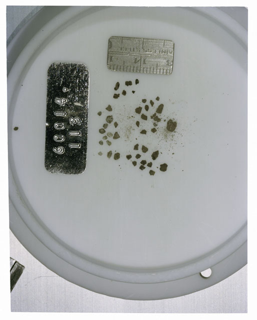 Color photograph of Apollo 16 Core Sample 60014,113; Processing photograph displaying >1 MM Core Fines .