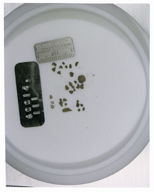 Color photograph of Apollo 16 Core Sample 60014,111; Processing photograph displaying >1 MM Core Fines .