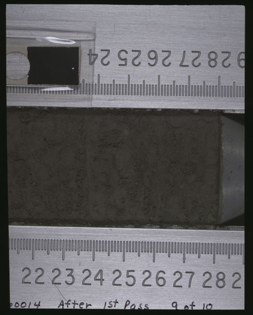 Color photograph of Apollo 16 Sample(s) 60014,0; 9 of 10 Processing photograph displaying after 1st dissection Core Tube at 21-29 cm depth.