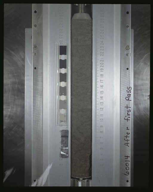 Color photograph of Apollo 16 Core Sample 60014,0; Processing photograph displaying an overview of the Core Tube after 1st dissection.