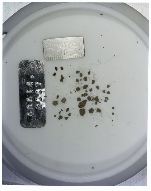 Color photograph of Apollo 16 Core Sample 60014,2007; Processing photograph displaying >1 MM Core Fines .