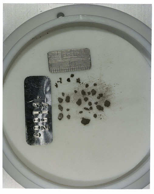 Color photograph of Apollo 16 Core Sample 60014,2017; Processing photograph displaying >1 MM Core Fines .