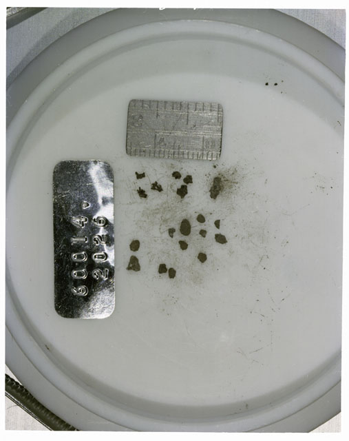 Color photograph of Apollo 16 Core Sample 60014,2026; Processing photograph displaying >1 MM Core Fines .