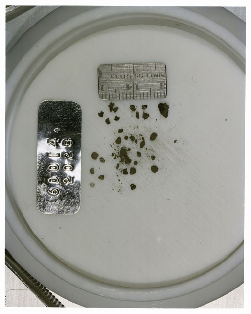 Color photograph of Apollo 16 Core Sample 60014,2028; Processing photograph displaying >1 MM Core Fines .