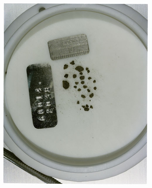 Color photograph of Apollo 16 Core Sample 60014,2038; Processing photograph displaying >1 MM Core Fines .