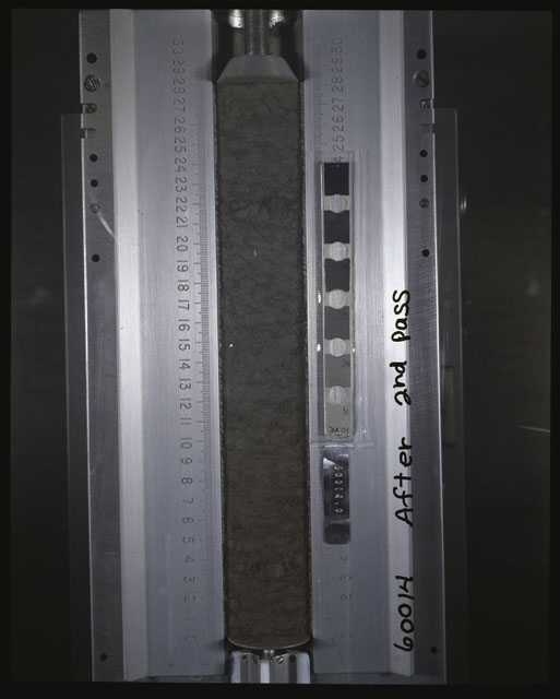 Color photograph of Apollo 16 Core Sample 60014,0; Processing photograph displaying an overview of the Core Tube after 2nd dissection.