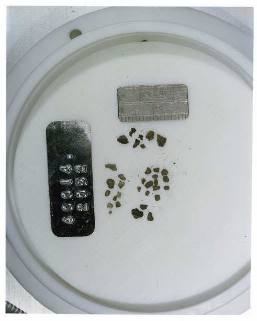 Color photograph of Apollo 16 Core Sample 60014,2052; Processing photograph displaying >1 MM Core Fines .