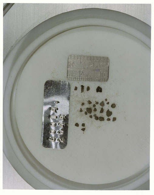 Color photograph of Apollo 16 Core Sample 60014,2044; Processing photograph displaying >1 MM Core Fines .