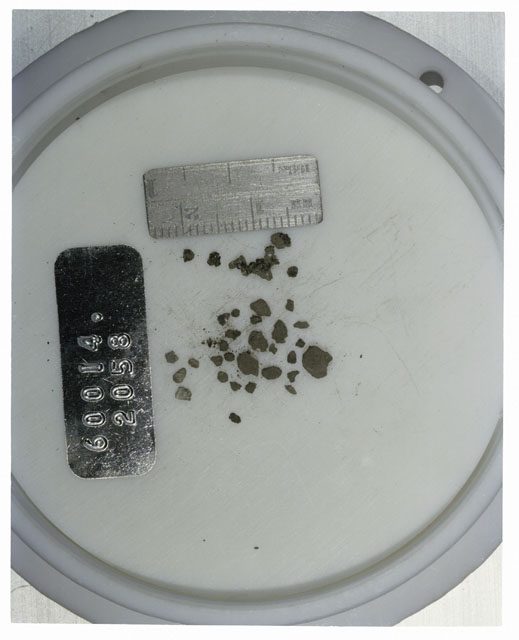 Color photograph of Apollo 16 Core Sample 60014,2058; Processing photograph displaying >1 MM Core Fines .