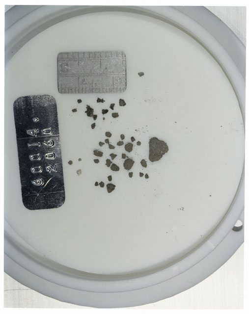 Color photograph of Apollo 16 Core Sample 60014,2060; Processing photograph displaying >1 MM Core Fines .